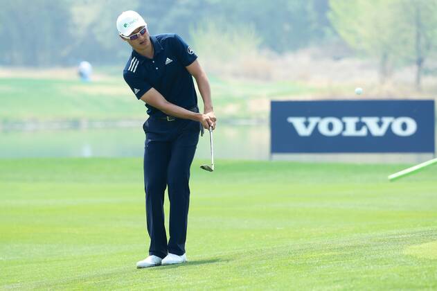 Li Haotong of China competes in the first round of the 2018 Volvo China Open golf tournament in Beijing, China, 26 April 2018. Golf players tee off 2018 Volvo China Open  20180426_48099