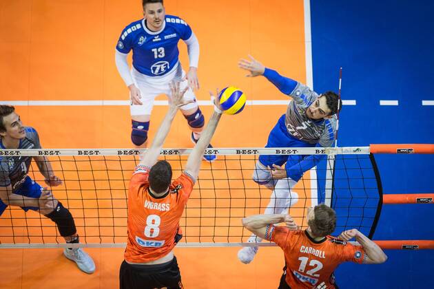 Berlin Germany 29 04 2018 Athanasios Protopsaltis Friedrichshafen 7 against the block from Graham Vigrass BR Volleys 8 and Paul Carroll BR Volleys 12 at Playoff Final Game 2 of the Volleyball Bundesliga between Berlin Recycling Volleys and VfB Friedrichshafen