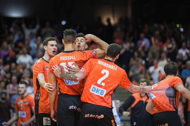 Berlin Germany 29 04 2018 Graham Vigrass BR Volleys 8 Russell Kyle BR Volleys 15 Adam White BR Volleys 11 and Steven Marshall BR Volleys 2 celebrate the Volleyball Bundesliga play-off final match between Berlin Recycling Volleys and VfB Friedrichshafen