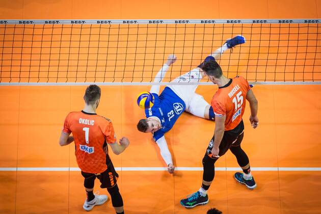 Berlin Germany 29 04 2018 Aleksandar Okolic BR Volleys 1 and Russell Kyle BR Volleys 15 look down on Markus Steuerwald Friedrichshafen 13 down at Playoff Final Game 2 of the Volleyball Bundesliga between Berlin Recycling Volleys and VfB Friedrichshafen