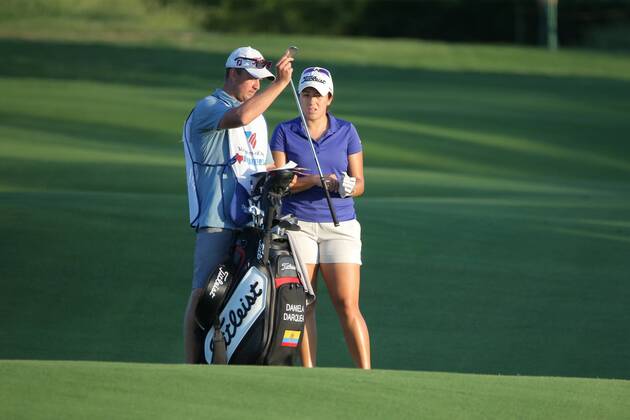 THE COLONY, TX - MAY 04: Daniela Darquea of Ecuador gets a club from her caddy on the 17th fairway during the first round of the Volunteers of America LPGA Golf Damen Texas Classic on May 4, 2018 at the Old American Golf Club in The Colony, TX. (Photo by George Walker Icon Sportswire) GOLF: MAY 04 LPGA - Volunteers of America Texas Classic Icon180504361 EDITORIAL USE ONLY