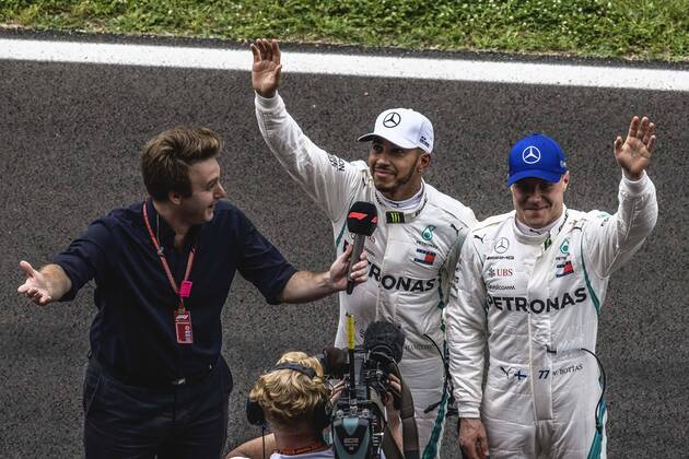 May 12, 2018 - Barcelona, Catalonia, Spain - LEWIS HAMILTON (GBR) and VALTTERI BOTTAS (FIN) from Mercedes greet the crowd as they are interviewed after winning the Pole Position for the Spanish GP at Circuit de Barcelona - Catalunya F1 2018: Spanish Grand Prix: Hamilton Wins Pole - ZUMAo105 20180512_zap_o105_010 Copyright: xMatthiasxOesterlex