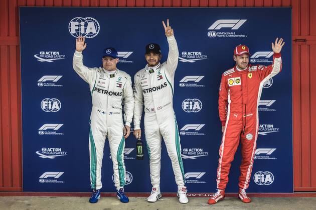 May 12, 2018 - Barcelona, Catalonia, Spain - VALTTERI BOTTAS (FIN), 2nd, LEWIS HAMILTON (GBR), 1st and SEBASTIAN VETTEL (GER), 3rd, greet the crowd after winning the Pole Position for the Spanish GP at Circuit de Barcelona - Catalunya F1 2018: Spanish Grand Prix: Hamilton Wins Pole - ZUMAo105 20180512_zap_o105_015 Copyright: xMatthiasxOesterlex