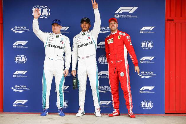 May 12, 2018 - Barcelona, Spain - Mercedes driver Valtteri Bottas (77) of Finland, Mercedes driver Lewis Hamilton (44) of Great Britain and Ferrari driver Sebastian Vettel (5) of Germany after the Q3 celebrated at Circuit of Barcelona 12th May 2018 in Barcelona, Spain. (Credit: NurPhoto) Spanish F1 Grand Prix - Qualifying  - ZUMAn230 20180512_zaa_n230_696 Copyright: xUrbanandsportx