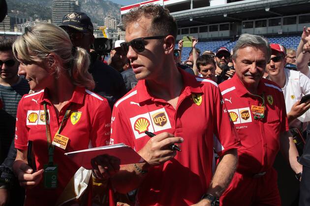 Photo4 LaPresse 25 03 2018 Monte Carlo, Monaco Grand Prix Formula One Monaco 2018 In the pic: Sebastian Vettel (GER) Scuderia Ferrari SF71H and Britta Roeske (AUT) Ferrari Press Officer.  Copyright: xPhoto4 LaPressex