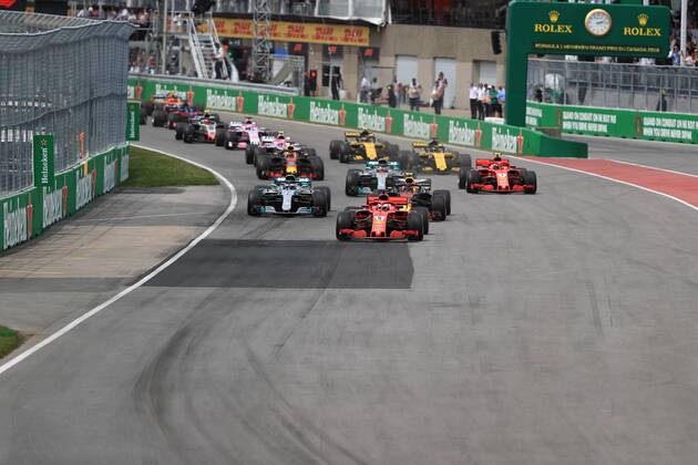 10th June 2018, Circuit Gilles-Villeneuve, Montreal, Canada; Canadian Formula One Grand Prix, race day; Scuderia Ferrari, Sebastian Vettel leads into turn 1 on lap 1  ActionPlus12035532 Octane