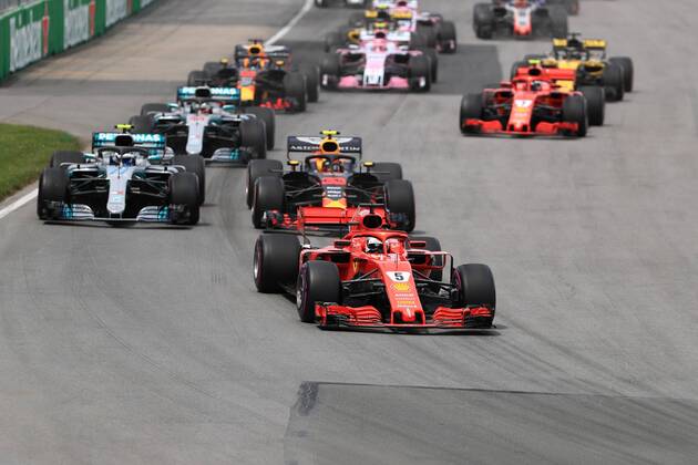 10th June 2018, Circuit Gilles-Villeneuve, Montreal, Canada; Canadian Formula One Grand Prix, race day; Scuderia Ferrari, Sebastian Vettel leads into turn 1 on lap 1  ActionPlus12035534 Octane