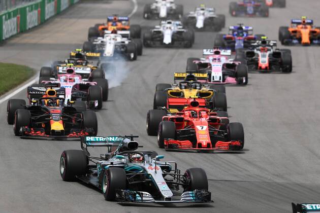 10th June 2018, Circuit Gilles-Villeneuve, Montreal, Canada; Canadian Formula One Grand Prix, race day; Scuderia Ferrari; Kimi Raikkonen runs behind Hamilton in 1st corner  ActionPlus12035536 Octane