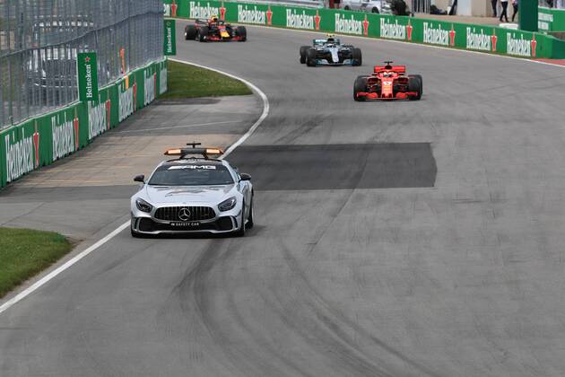 10th June 2018, Circuit Gilles-Villeneuve, Montreal, Canada; Canadian Formula One Grand Prix, race day; Scuderia Ferrari, Sebastian Vettel leads under safety car precaution  ActionPlus12035546 Octane
