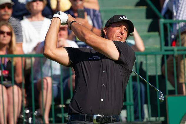 Phil Mickelson from the United States tees off on the 10th hole in the first round of the 118th U.S. Open Championship at Shinnecock Hills Golf Club in Southampton, New York on June 14, 2018.  NYP20180614106 COREYxSIPKIN