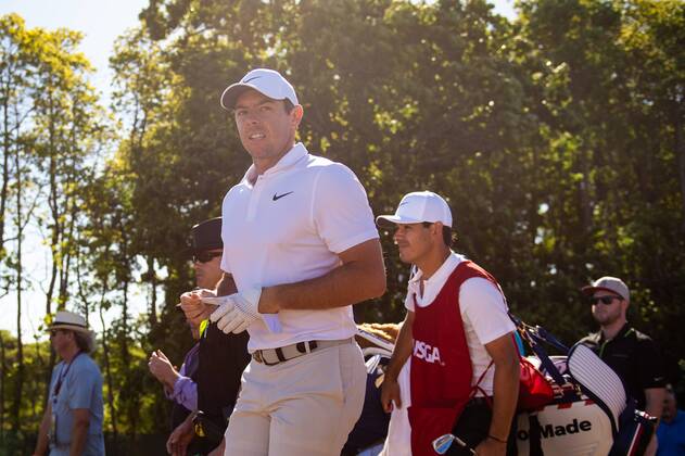 Rory McIlroy from Northern Ireland after hitting out of the rough on the 12th fairway in the first round of the 118th U.S. Open Championship at Shinnecock Hills Golf Club in Southampton, New York on June 14, 2018.  NYP20180614131 COREYxSIPKIN