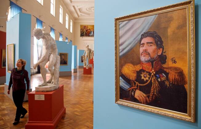 ST PETERSBURG, RUSSIA â€“ JUNE 21, 2018: Portrait of retired Argentine footballer Diego Maradona by Italian artist Fabrizio Birimbelli on display at the Like the Gods exhibition featuring paintings of football stars in historical uniforms at the Museum of the Russian Academy of Arts during the 2018 FIFA World Cup WM Weltmeisterschaft Fussball Alexander Demianchuk TASS  83927463st
