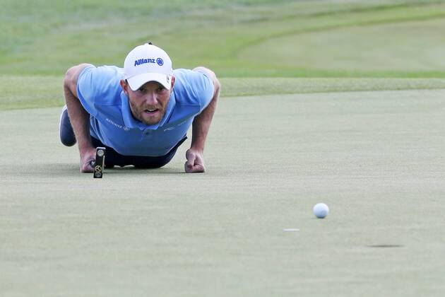 Max Kieffer GER plays to control the victory with 3 day putting line while lying down 30 BMW International Open Golf Open Golf Gut Laerchenhof Koeln 23 06 2018 BMW International Open Golf Koeln Copyright: xRoskaritzx Eibner-Pressefotox EP_fh_rrz