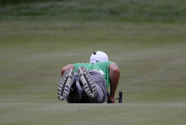Golf 30 BMW International Open Golf Club Lärchenhof Pulheim near Cologne on 24 June 2018 Maximilian KIEFFER GER tries to read the Green Green while lying down to sink the ball into the hole with a successful putt