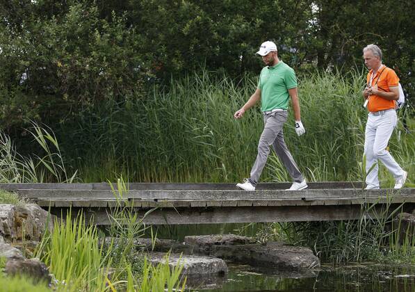 Golf 30 BMW International Open Golf Club Lärchenhof Pulheim near Cologne on 24 June 2018 Maximilian KIEFFER GER li crosses a bridge on his way to the fairway after his tee shot