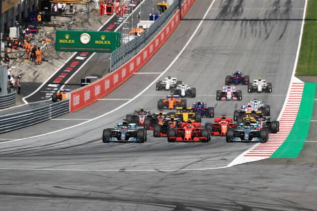 1st July 2018, Red Bull Ring, Spielberg, Austria; Austrian Formula One Grand Prix, Sunday race day; Mercedes AMG Petronas Motorsport, Valtteri Bottas, Lewis Hamilton and Scuderia Ferrari, Kimi Raikkonen go three wide into Turn 1 as Hamilton takes the lead  ActionPlus12043161 LeannexBoon