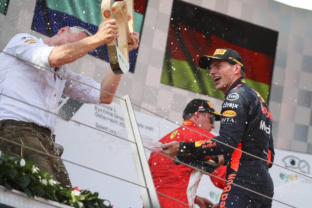 FORMULA 1 - GP of Austria 2018 SPIELBERG,AUSTRIA,01.JUL.18 - MOTORSPORTS - Grand Prix of Austria, Red Bull Ring. Image shows the rejoicing of Max Verstappen (NED Red Bull Racing). Keywords: champaign. GEPAxpictures xChristianxWalgram
