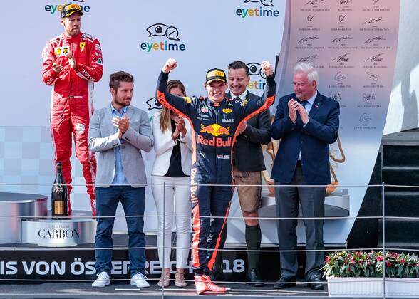 01 07 2018 Red Bull Ring Spielberg AUT FIA Formula 1 Grand Prix of Austria Races in the picture Sebastian Vettel GER Scuderia Ferrari Marcel Hirscher AUT Winner Max Verstappen NED Red Bull Racing German Formula One driver Sebastian Vettel of Scuderia Ferrari Marcel Hirscher AUT Racewinner Dutch Formula One driver Max Verstappen of Red Bull Racing at the Austrian FIA Formula One Grand Prix at the Red Bull Ring at Spielberg France on 2018 07 01 Spielberg  EX_FEI