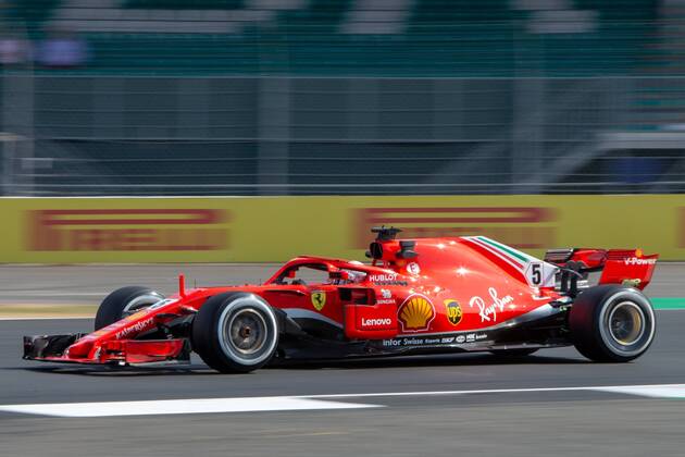 6th July 2018, Silverstone Circuit, Silverstone, England; British Formula One Grand Prix, Friday free practice; Sebastian Vettel in his Scuderia Ferrari SF71H  ActionPlus12044431 TimxWilliams