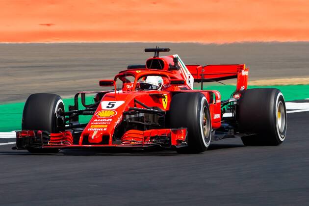 6th July 2018, Silverstone Circuit, Silverstone, England; British Formula One Grand Prix, Friday free practice; Sebastian Vettel in his Scuderia Ferrari SF71H  ActionPlus12044438 TimxWilliams