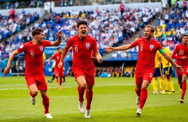 SAMARA, RUSSIA - JULY 7, 2018: England s John Stones, Harry Maguire and Harry Kane (L-R) celebrate scoring in the 2018 FIFA World Cup WM Weltmeisterschaft Fussball Quarterfinal match against Sweden at Samara Arena Stadium. Denis Tyrin TASS  TS088712