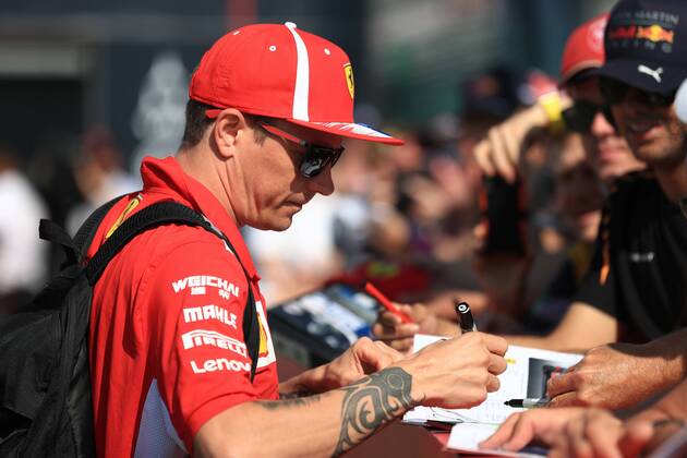 8th July 2018, Silverstone Circuit, Silverstone, England; British Formula One Grand Prix, Race Day; Scuderia Ferrari, Kimi Raikkonen signs autographs  ActionPlus12045421 Octane