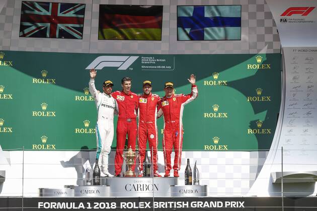 Motorsports: FIA Formula One World Championship WM Weltmeisterschaft 2018, Grand Prix of Great Britain, 44 Lewis Hamilton (GBR, Mercedes AMG Petronas Motorsport), Claudio Albertini, 5 Sebastian Vettel (GER, Scuderia Ferrari), 7 Kimi Raikkonen (FIN, Scuderia Ferrari), Silverstone Great Britain