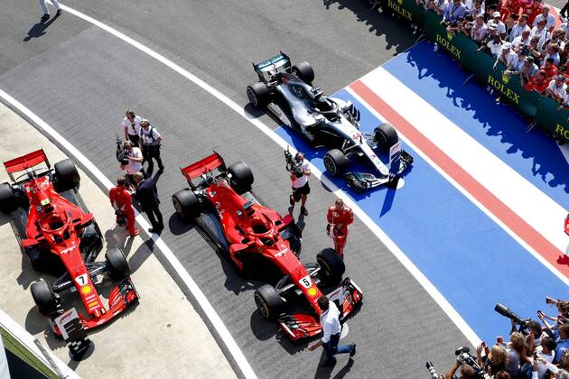 Motorsports: FIA Formula One World Championship WM Weltmeisterschaft 2018, Grand Prix of Great Britain, 7 Kimi Raikkonen (FIN, Scuderia Ferrari), 5 Sebastian Vettel (GER, Scuderia Ferrari), Silverstone Great Britain
