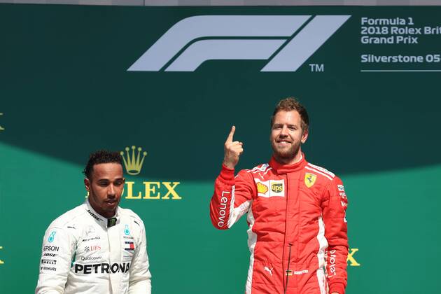 8th July 2018, Silverstone Circuit, Silverstone, England; British Formula One Grand Prix, Race Day; Scuderia Ferrari, Sebastian Vettel wins at Silverstone followed by Lewis Hamilton  ActionPlus12045574 Octane