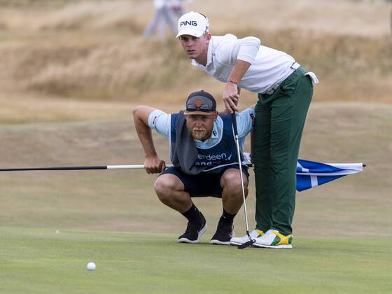 15th July 2018, Gullane Golf Club, Gullane, Scotland; Aberdeen Investments Scottish Open Golf, 4th round; Brandon Stone with caddy on the 17th green as he headed for a closing round 60  ActionPlus12048150 AlanxRennie