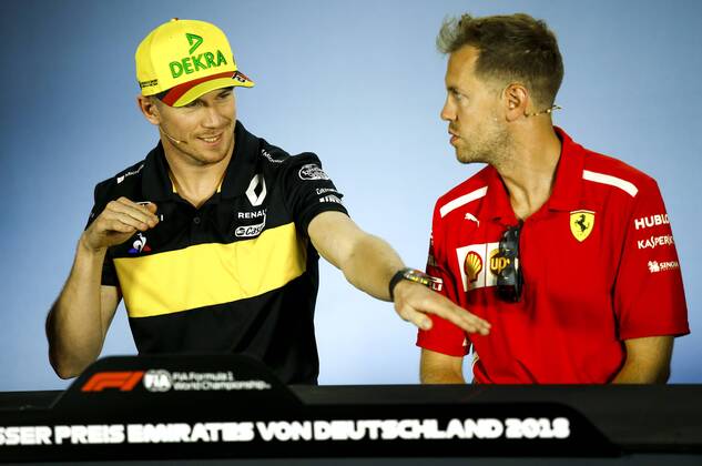 Sport Bilder des Tages Motorsports: FIA Formula One World Championship WM Weltmeisterschaft 2018, Grand Prix of Germany, 27 Nico Hulkenberg (GER, Renault Formula One Team), 5 Sebastian Vettel (GER, Scuderia Ferrari), Hockenheim Germany