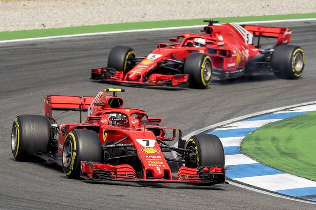 Motorsport Formula 1 season 2018 2019 race on Sunday 22 07 2018 at the Hockenheimring in Hockenheim Germany Kimi Raikkonen Scuderia Ferrari drives ahead of Sebastian Vettel Scuderia Ferrari through the Motodrom Copyright: xInderliedx