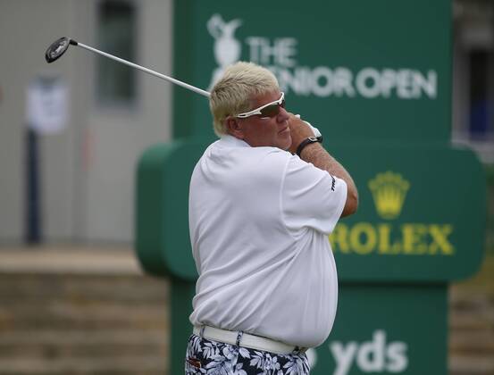 26th July 2018, Old Course at St Andrews, St Andrews, Scotland; The 2018 Senior Open Golf Championships, 1st round; John Daly (USA) plays his tee shot on the opening hole  ActionPlus12050493 AlanxMartin