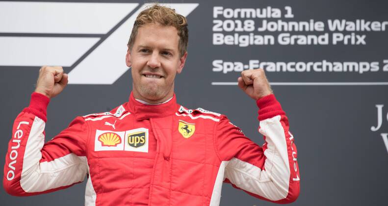 Ferrari s German driver Sebastian Vettel celebrates on the podium after winning the Spa-Francorchamps Formula One Grand Prix of Belgium race, in Spa-Francorchamps, Sunday 26 August 2018. BENOITxDOPPAGNE x05414416x