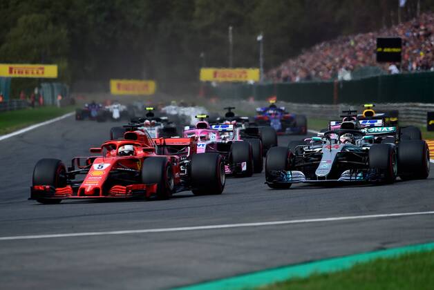 Sebastian Vettel Scuderia Ferrari passing Lewis Hamilton Mercedes Grand Prix Formula 1 GP Belgium at Spa 26 08 2018 Photo mspb Jean Petin Sebastian Vettel driving past Lewis Hamilton Formula 1 GP Belgium 2018