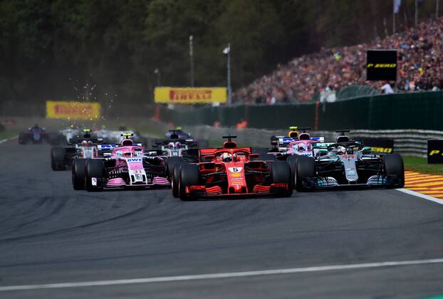 Sebastian Vettel Scuderia Ferrari passing Lewis Hamilton Mercedes Grand Prix Formula 1 GP Belgium at Spa 26 08 2018 Photo mspb Jean Petin Sebastian Vettel driving past Lewis Hamilton Formula 1 GP Belgium 2018