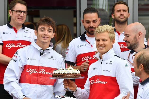 left Charles Leclerc Alfa Romeo Sauber F1 Team passes birthday cake to Marcus Ericsson Alfa Romeo Sauber F1 Team Italian Grand Prix Renntag 02 09 2018 ITA Italian Grand Prix 02 09 2018 Monza Copyright: xEIBNER JerryxAndrex EP_EER