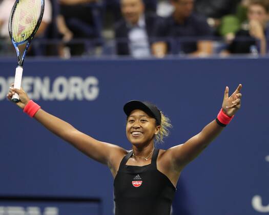 Naomi Osaka reaches up and cheers joy cheering emotion Copyright: xJuergenxHasenkopfx
