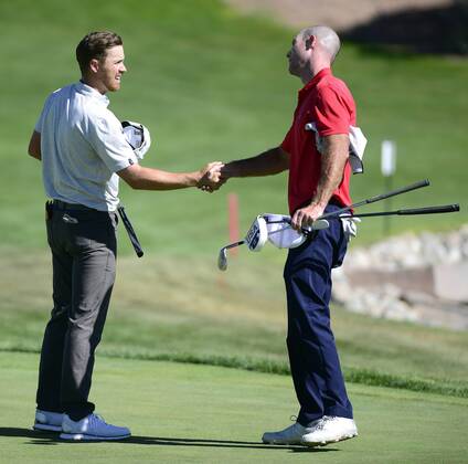September 13, 2018 - Albuquerque, NEW MEXICO, U.S. - 091318 .Sam Saunders,<cq>,left is congratulated by 2nd place finisher Jeff Burton,<cq>., after hitting the winning shot in the Final Round of the New Mexico Open held at Sandia Golf Course .Photographed on Thursday September 13, 2018 Journal News - September 13, 2018 - ZUMAab1_ 85445269st Copyright: xAdolphexPierre-Louisx