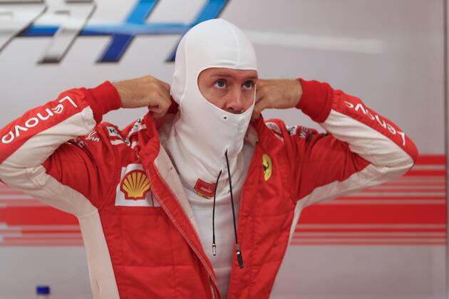 15th September 2018, Marina Bay Street Circuit, Singapore; Formula One Grand Prix of Singapore, Qualification; Scuderia Ferrari, Sebastian Vettel  ActionPlus12062515 Octane
