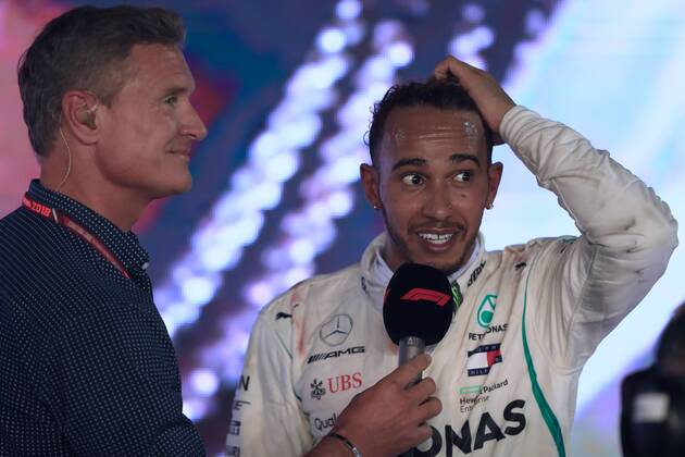 16th September 2018, Marina Bay Street Circuit, Singapore; Formula One Grand Prix of Singapore, race day; Mercedes AMG Petronas Motorsport, Lewis Hamilton wins in Singapore and talks with David Coulthard on the podium  ActionPlus12063176 Octane