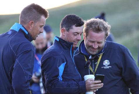 Luke Donald (L), Rory McIlroy (C) and Graeme McDowell arrive for the Ryder Cup European team photo at Le Golf National in Guyancourt near Paris on September 25, 2018.  PAR20180925043 DAVIDxSILPA