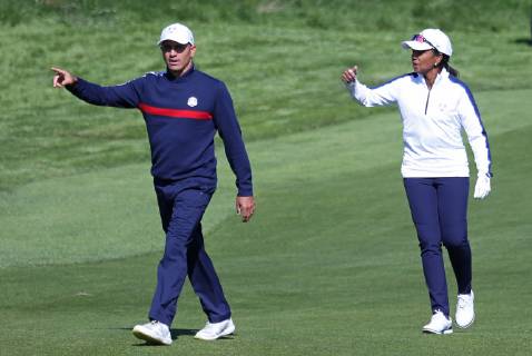 Kelly Slater (L) and Condoleezza Rice walk the fairway during a Ryder Cup 2018 celebrity tournament at Le Golf National in Guyancourt near Paris on September 25, 2018. The three-day main event Ryder Cup featuring Team USA versus Team Europe starts Friday, September 28th.  PAR20180925101 DAVIDxSILPA