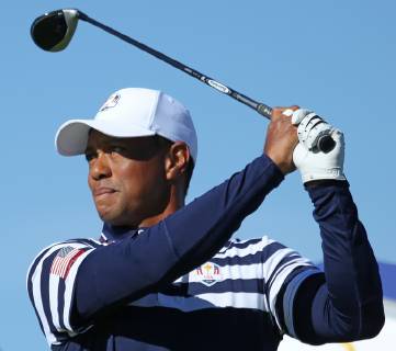 Tiger Woods hits a shot during a Ryder Cup 2018 practice session at Le Golf National in Guyancourt near Paris on September 26, 2018. The three-day tournament features Team USA versus Team Europe and starts Friday, September 28th.  PAR20180926042 DAVIDxSILPA