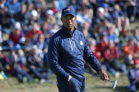 Tiger Woods pauses on the 9th green on day two of the Ryder Cup at Le Golf National in Guyancourt near Paris on September 29, 2018.  PAR20180929009 DAVIDxSILPA