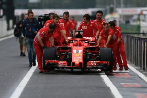 4th October 2018, Suzuka International Racing Course, Suzuka City, Japan; Formula One of Japan, driver arrivals and press conference PK Pressekonferenz Scuderia Ferrari team pushes Sebastian Vettel car back from the FIA garage  ActionPlus12067918 Octane