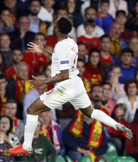 England s Raheem Sterling celebrates after scoring the 0-1 lead during a UEFA Nations League soccer match between Spain and England at Benito Villamarin stadium in Sevilla, southern Spain, 15 October 2018. Spain vs England !ACHTUNG: NUR REDAKTIONELLE NUTZUNG!  Copyright: xJOSExMANUELxVIDALx GRAF7280 20181015-636752347271591969