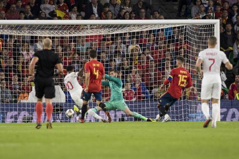 October 15, 2018 - Seville, Spain - RAHEEM STERLING of England (L ) scores for 3-0 during the UEFA Nations League Group A4 soccer match between Spain and England at the Benito Villamarin Stadium Soccer 2018 - Spain vs England - ZUMAa142 20181015_zap_a142_012 Copyright: xDanielxGonzalezxAcunax