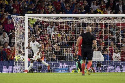 October 15, 2018 - Seville, Spain - RAHEEM STERLING of England (L ) celebrates after scoring 3-0 during the UEFA Nations League Group A4 soccer match between Spain and England at the Benito Villamarin Stadium Soccer 2018 - Spain vs England - ZUMAa142 20181015_zap_a142_014 Copyright: xDanielxGonzalezxAcunax