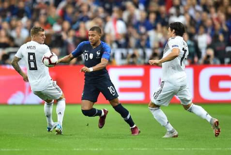 Football UEFA Nations League France Germany on 16 10 2018 at Stade de France in Paris Toni Kroos Germany links Kylian Mbappe France middle Nico Schulz Germany right DFB regulations prohibit any use of images as image sequences or quasi video xTTx